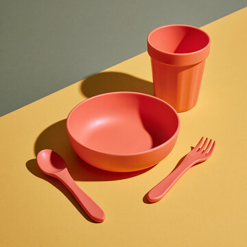 Minimalist modern pink children tableware set including bowl cup spoon and fork with children