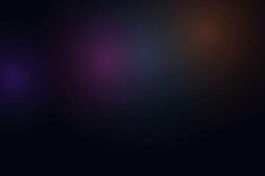 Abstract dark background featuring soft gradient light spots and flares.