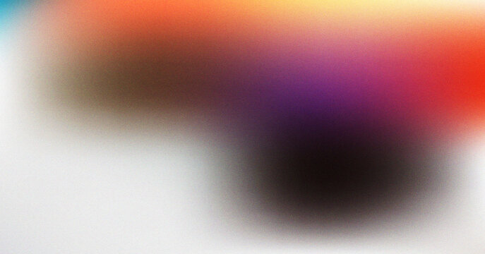 Abstract vibrant gradient texture with soft grain effect in warm colorful light and smooth transitions