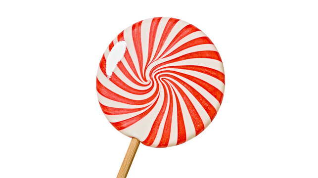 Red and white swirled lollipop on wooden stick