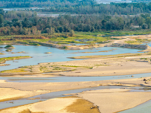 Aerial view of the Drina river with its winding channels, sandbanks, and lush green vegetation along the banks in Crna Bara, Macva District, Serbia.