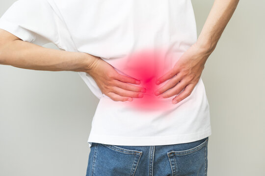 Pain body muscles stiff problem, asian young man, male painful with back, neck ache from work hand holding massaging rubbing shoulder hurt, sore on white background. Health care and medicine concept