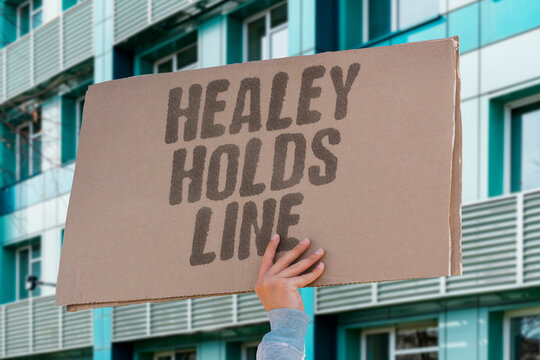 "Healey Holds Line" Chancellor maintains current economic stance despite pressure. HEALEY. CHANCELLOR. HOLDS. LINE. ECONOMY.