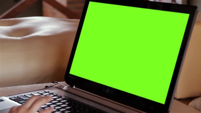 Close Up Of Person Using Laptop Touchpad With Chroma Key Green Screen - 4K
