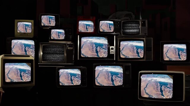 Middle East Desert Region from Space on Retro 80s Televisions, Elements of this Video furnished by NASA - 4K