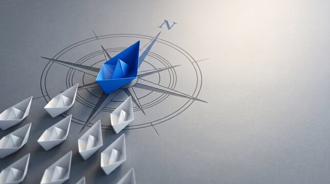 Business direction and strategic navigation concept with blue paper boat on compass for leadership and goal planning