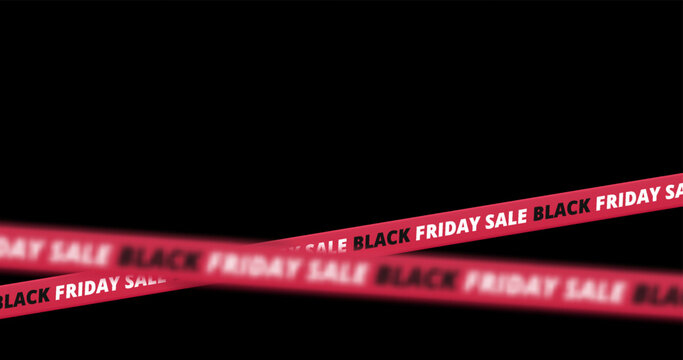 Black Friday Sale Red Tape with Depth of Field Effect Isolated on Black Background