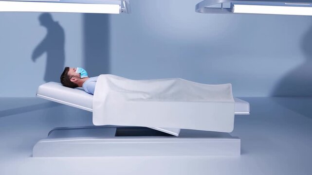 Masked man lies covered on medical imaging table in clinical room with shadow on wall