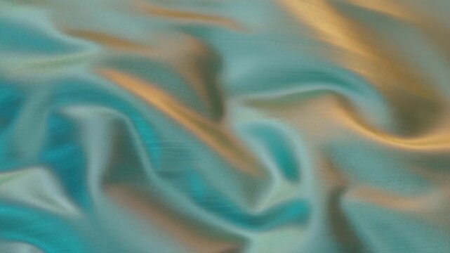 Abstract turquoise and beige fabric folds flowing in soft waves across a textured surface