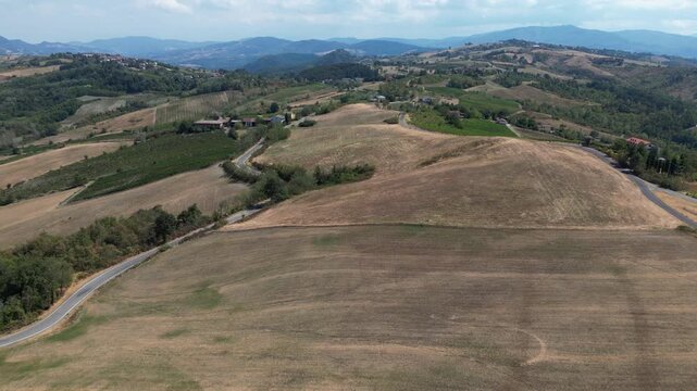 Europe, Italy, Lombardy, Pavia, Mont&ugrave; Berchielli &ndash; drone view of the Oltrep&ograve; Pavese hills; drought and water shortages lead to an early grape harvest for wine production. Global warming and climate ch