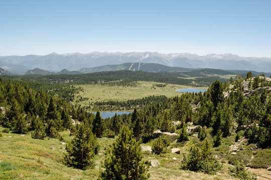 Mountain lakes and forest view on Pic Carlit route in Pyrenees