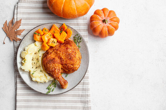 Autumn meal: roasted chicken with pumpkin and mashed potato