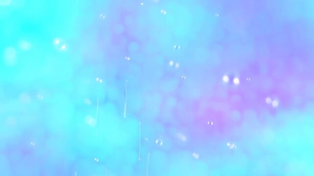 Abstract turquoise and lavender gradient background with floating bubbles, soft bokeh, and light streaks