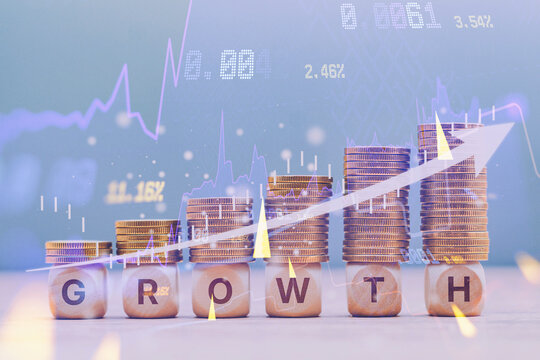 Wooden blocks spelling GROWTH with increasing coin stacks and rising financial graph overlay. Business investment development, stock market performance, capital appreciation or wealth management.