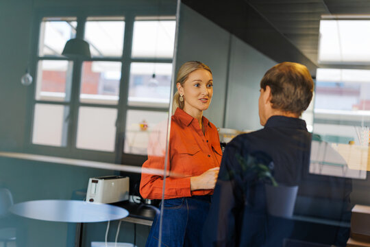 Woman and man in a shared communication area