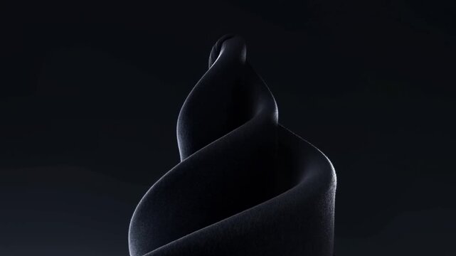 Abstract black twisted ribbon sculpture against a dark background with layered curved folds