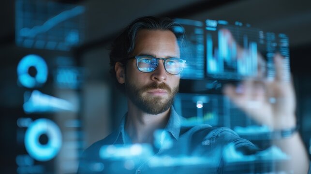 Man analyzing digital data on transparent screen