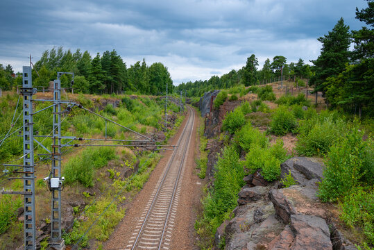 Railway with a deep cut in the grate rocks