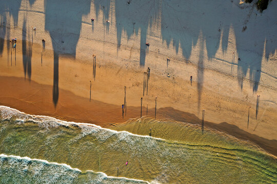 Freshwater Beach, Sydney, Australia Shadows of surrounding buildings on the surf beach