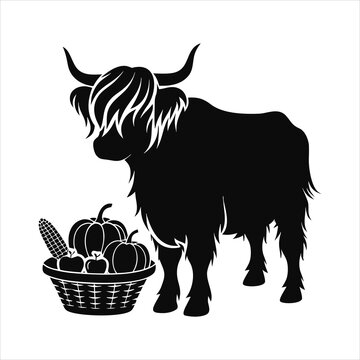 Highland cow silhouette standing next to harvest basket full of vegetables