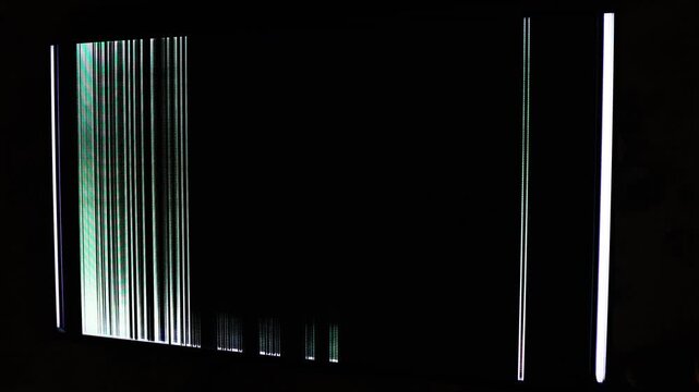 Damaged TV Screen Showing Vertical Colored Lines And Display Glitches