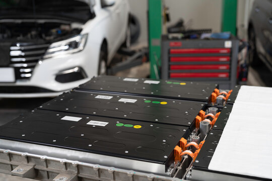 Electric vehicles, Battery pack, High-voltage battery. Specialized EV car garage. Provides maintenance, electrical diagnostics, parts replacement, wall charger installation
