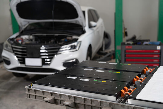 Electric vehicles, Battery pack, High-voltage battery. Specialized EV car garage. Provides maintenance, electrical diagnostics, parts replacement, wall charger installation