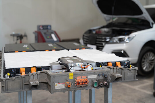 Electric vehicles, Battery pack, High-voltage battery. Specialized EV car garage. Provides maintenance, electrical diagnostics, parts replacement, wall charger installation