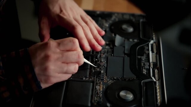 Laptop Motherboard Repair with Tweezers