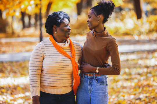 Sharing a pleasant conversation on a crisp autumn day