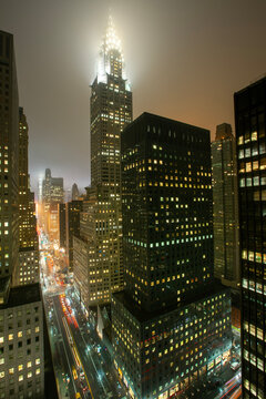 New York City, USA; 27th December 2012: The landmark New York City Chrysler Building is a world famous masterwork of Art Deco architecture seen here towering over 42nd Street.