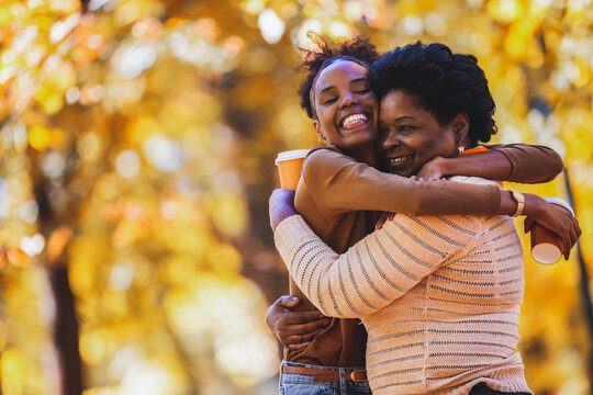 Deep emotional embrace between mother and daughter