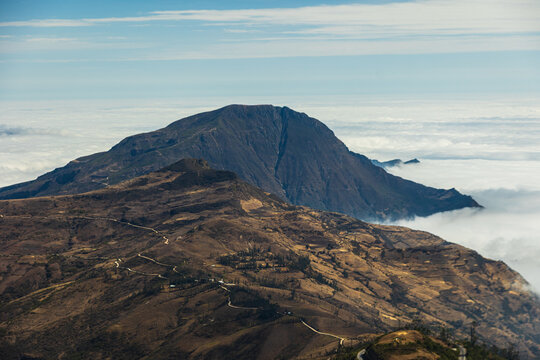 Sea of clouds over the Andean mountains of Llama, Chota, Peru