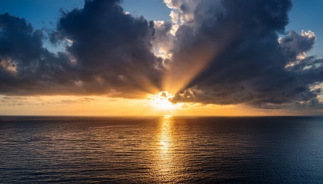 golden light breaking through dark storm clouds over a calm ocean horizon a dramatic reflective seascape evoking awe and quiet hope