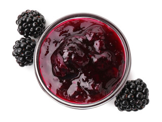 Fototapeta premium Delicious blackberry jam in glass bowl and fresh berries isolated on white, top view