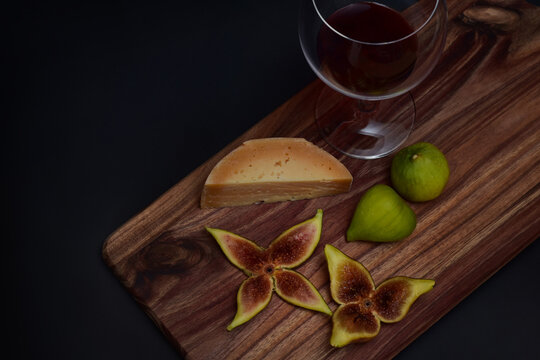 Still life with figs, cheese and wine