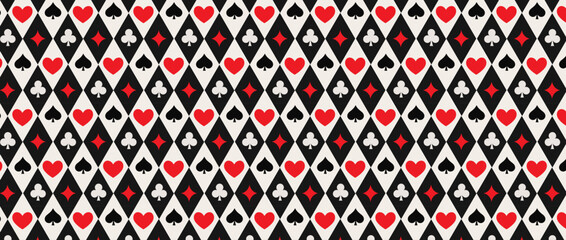Seamless playing cards pattern. Repeated diamonds, spades, clubs, hearts symbols background. Poker or casino table theme wallpaper. Repeating lozenge gambling concept texture. © Adimas