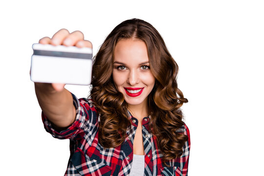 Close up portrait of beautiful amazing she her lady arm hold advice credit card bank novelty feedback take it closer to camera help see wearing casual checkered plaid shirt isolated grey background