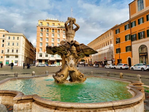 Rome, Italy - December 2021: Triton Fountain in barberini square in Rome Italy