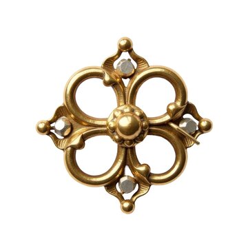 A detailed view of a shiny golden brooch