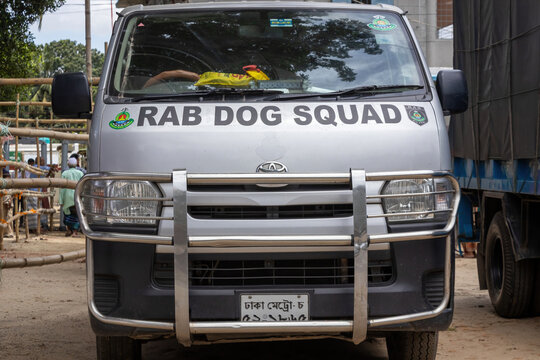 Kishoreganj, Bangladesh - 16 August, 2026 - Rapid Action Battalion dog squad vehicle stands parked outdoors. Security forces deploy canine unit van for public safety duty.
