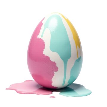 A colorful painted egg sits atop a puddle of paint, a creative and playful scene