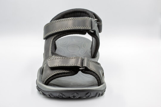 Black Lasocki sport sandals with velcro straps pair closeup.