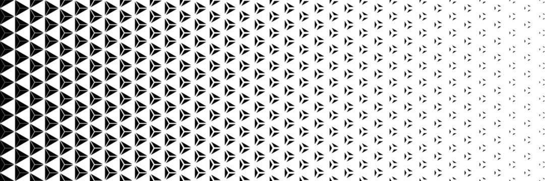 horizontal halftone of separated black triangle on white for pattern and background.