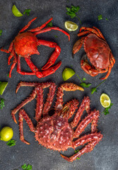 Crabs seafood background with crabs selections on black background © lblinova