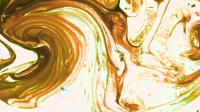Brightly illuminated liquid pigments blend and shift across a surface creating complex organic color combinations and fluid dynamics through natural surface tension interactions.