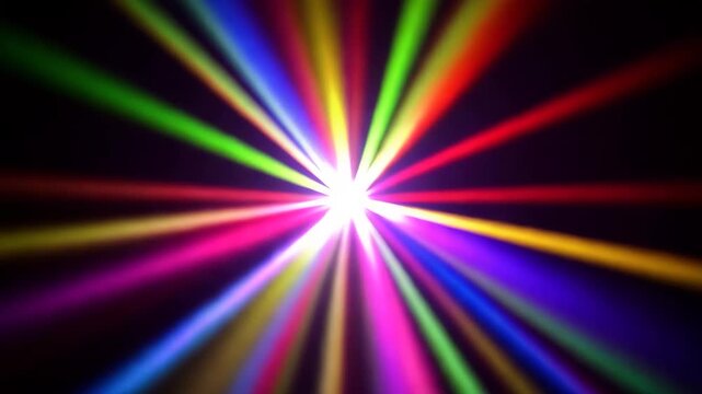 Vibrant radial light burst with rainbow colors exploding in dark motion Video