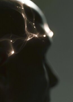 Close-up of a human head and neck. the head is facing towards the right side of the image, with the left side slightly tilted to the left.