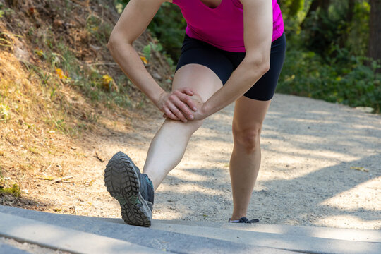 Woman Runner Stretching Knee on Little Mountain Stairs in Chilliwack BC Outdoor Workout