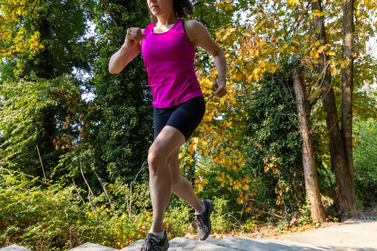 Woman Running Up Outdoor Stairs For Fitness Training On Little Mountain Stairs, Chilliwack, BC Canada